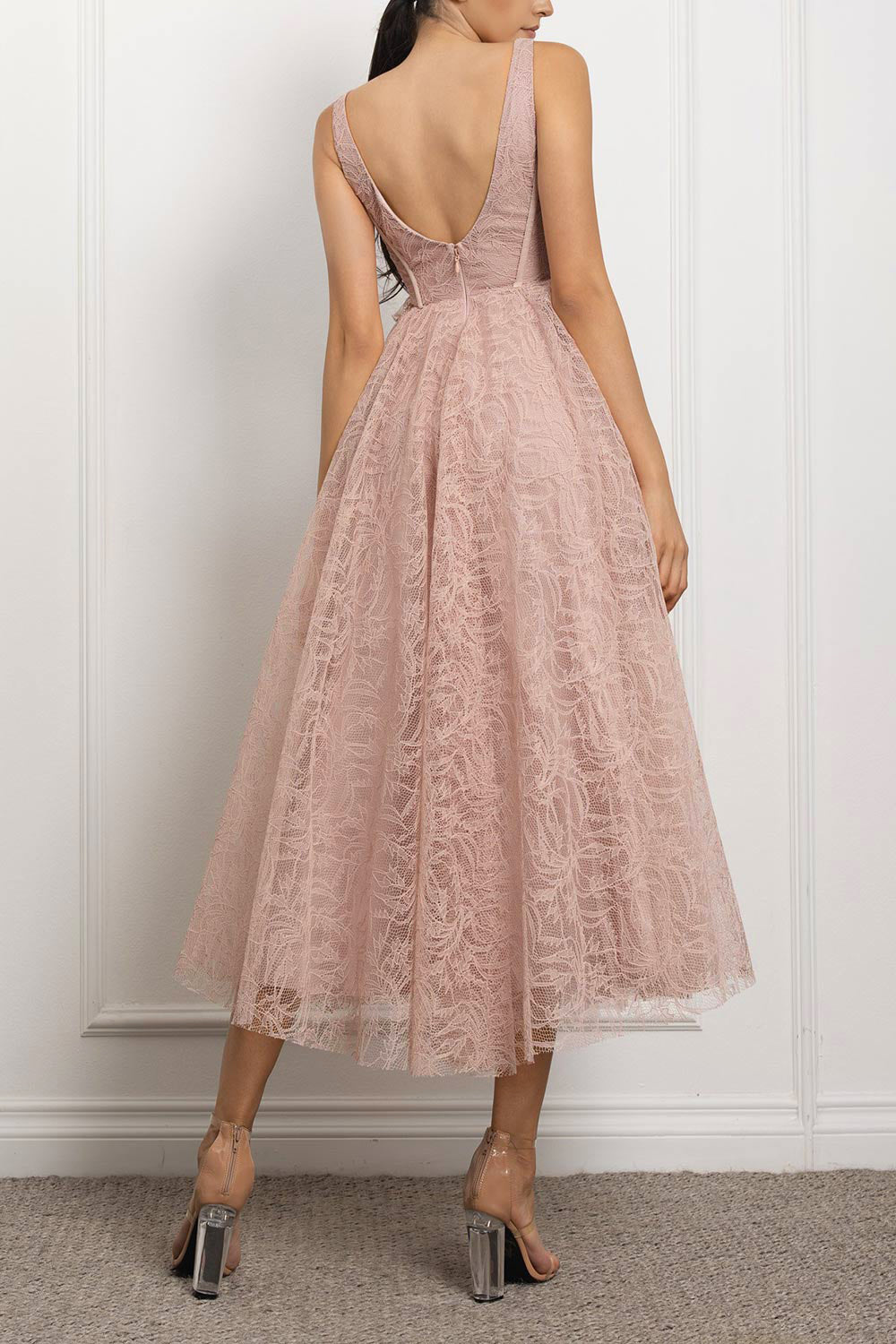 back of a woman wearing Hellis Pink Midi Dress with 3D Flower from Boutique 1861