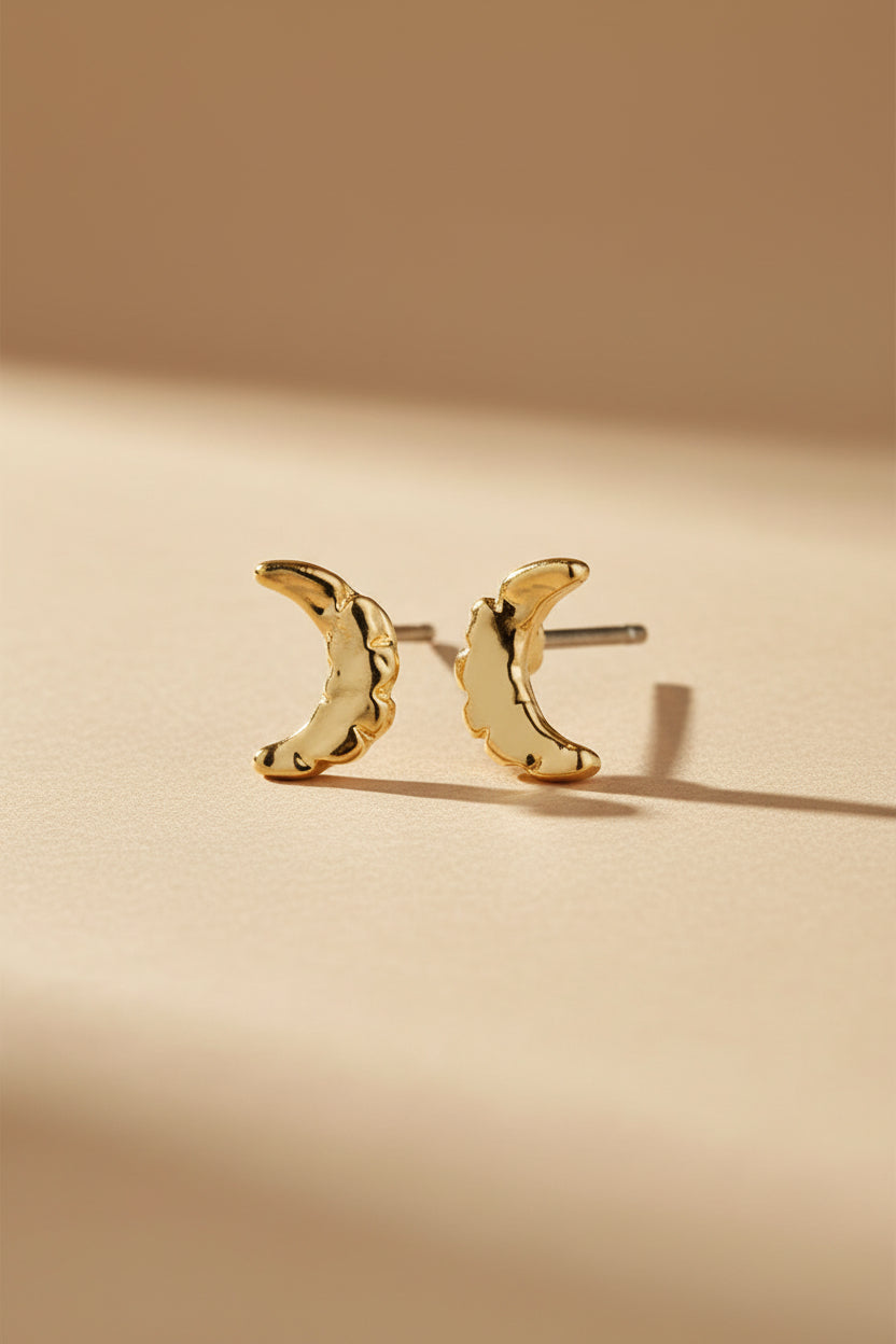 Gold crescent moon earrings HIMEJI-GOLD by Pilgrim on a white background