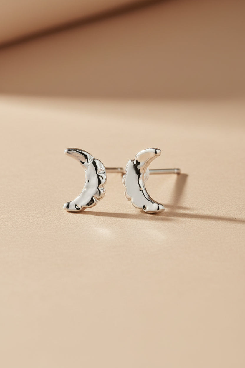 Silver moon-shaped earrings HIMEJI-SILVER by Pilgrim on a white background