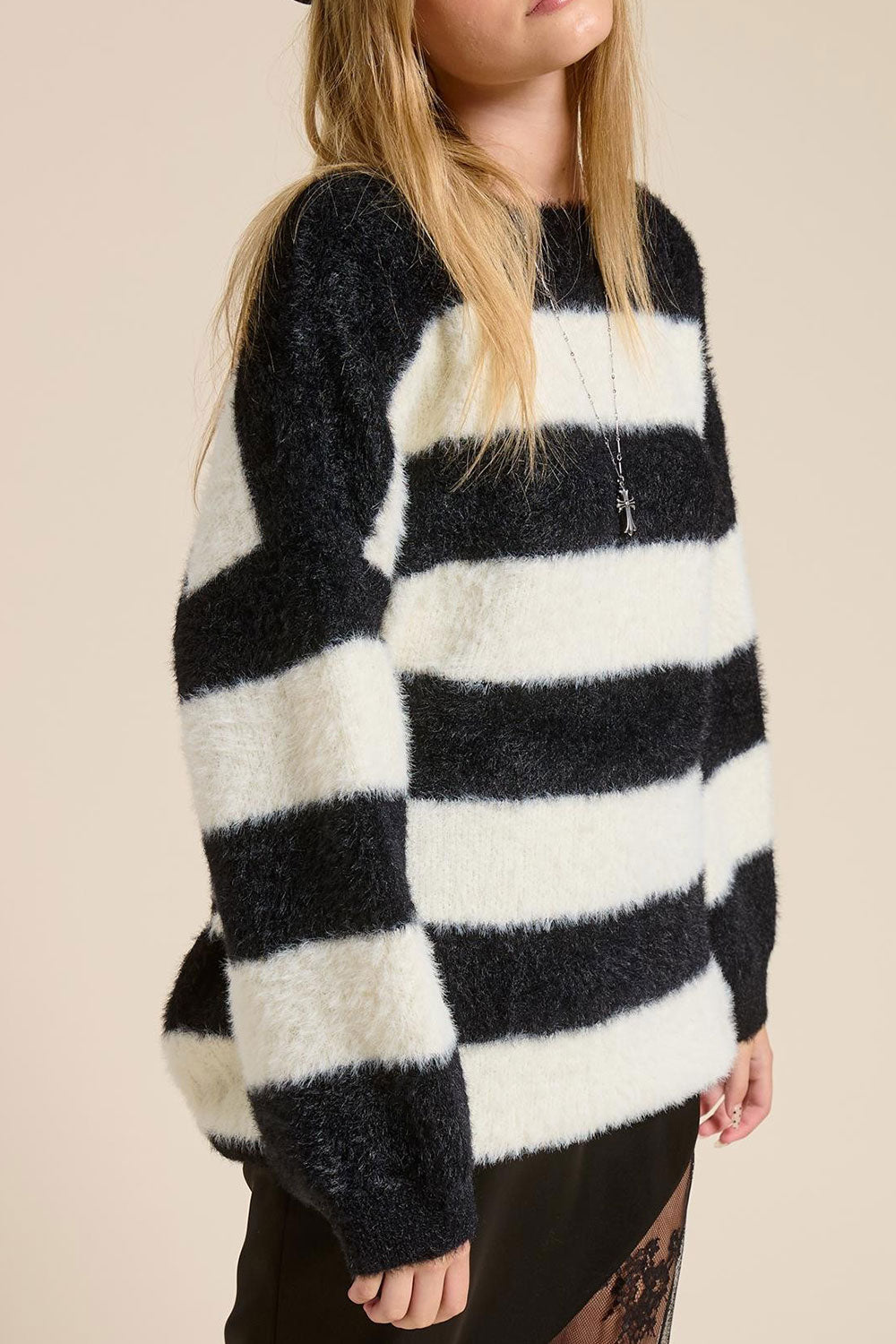 Person wearing Hardin Black Oversized Striped Fluffy Sweater from La petite garçonne side
