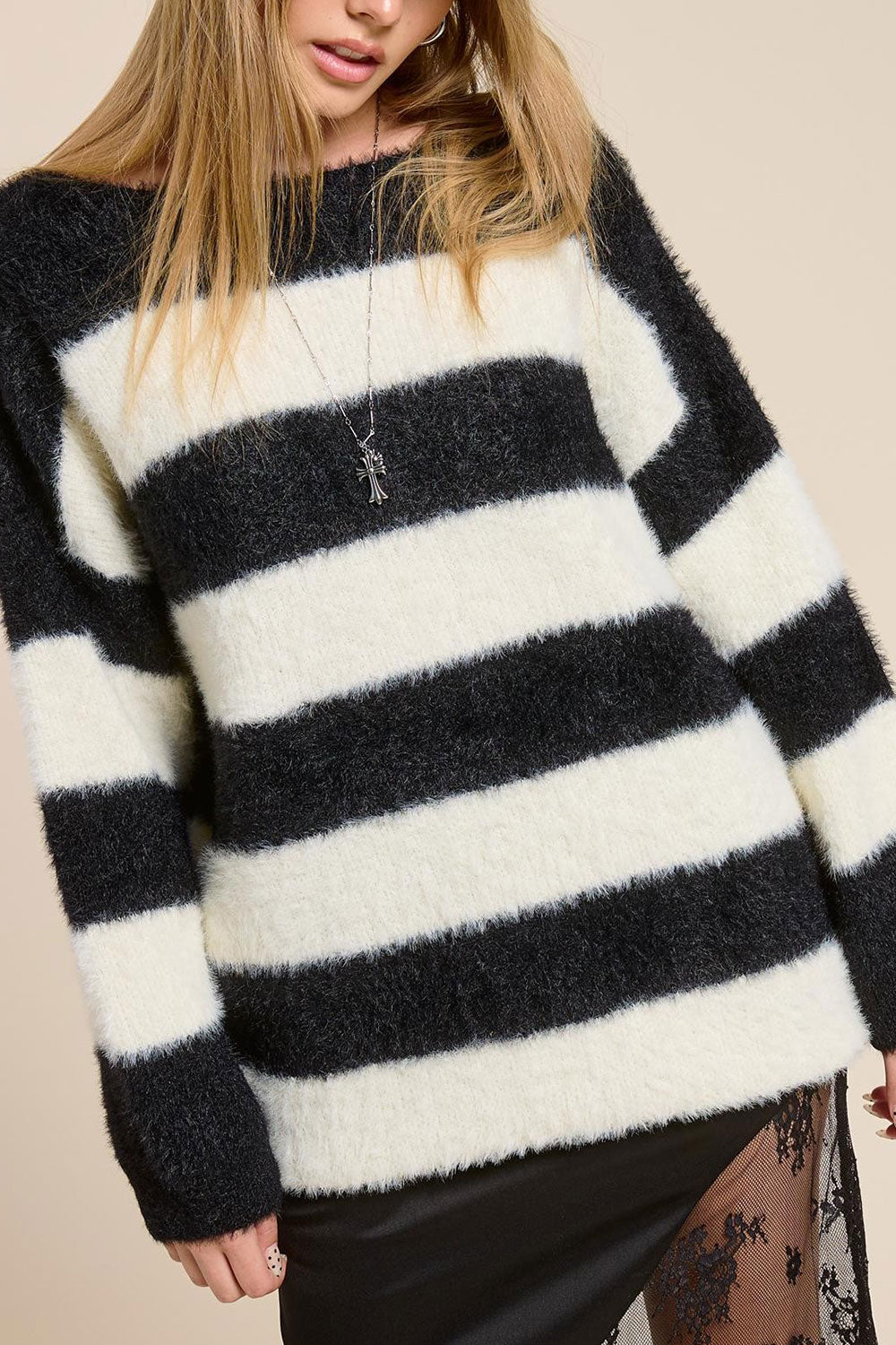 Person wearing Hardin Black Oversized Striped Fluffy Sweater from La petite garçonne front