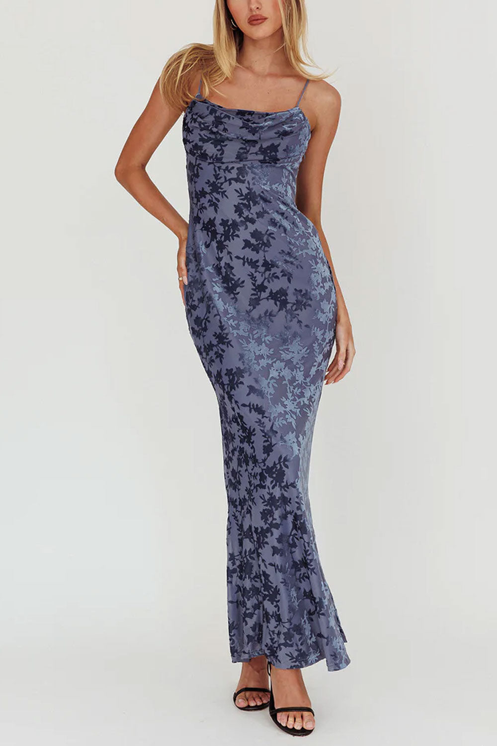 Person wearing Haylin Blue Velvet Floral Fitted Maxi Dress from Boutique 1861