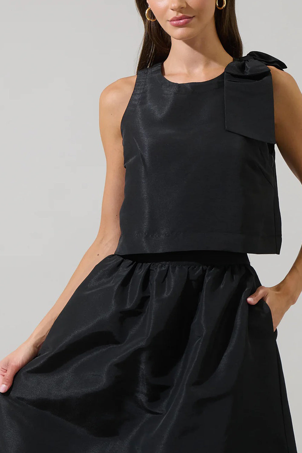 Caryn Black Sleeveless Top with Bow | Boutique 1861 front model