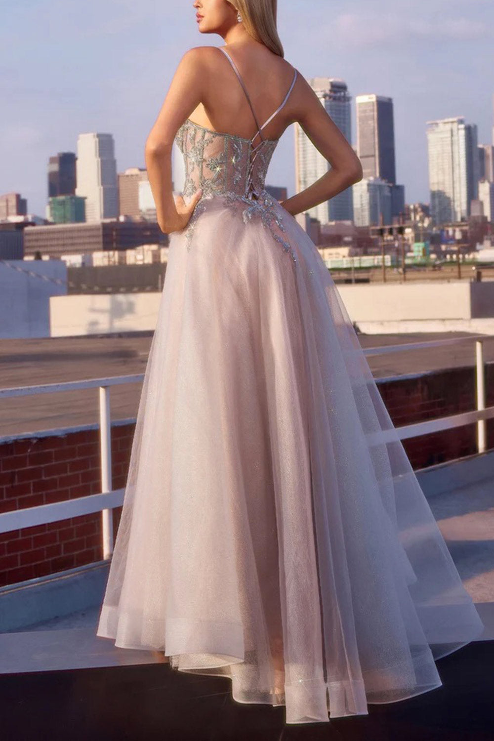 back of a woman wearing Jackie Glittery Beaded Maxi Dress from Boutique 1861