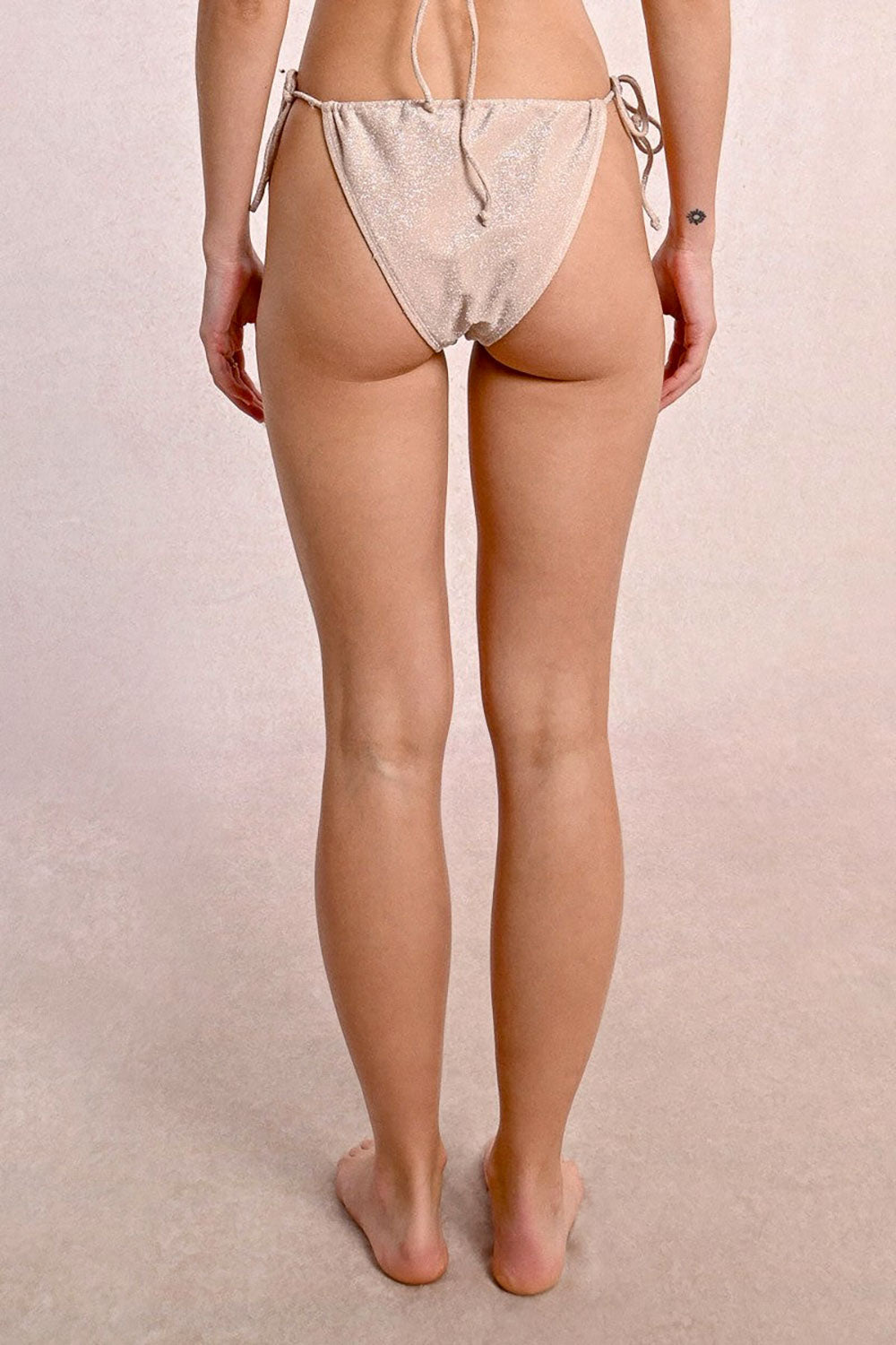 Kailua Sparkly Champagne Swimsuit Bottom | La petite garçonne model back