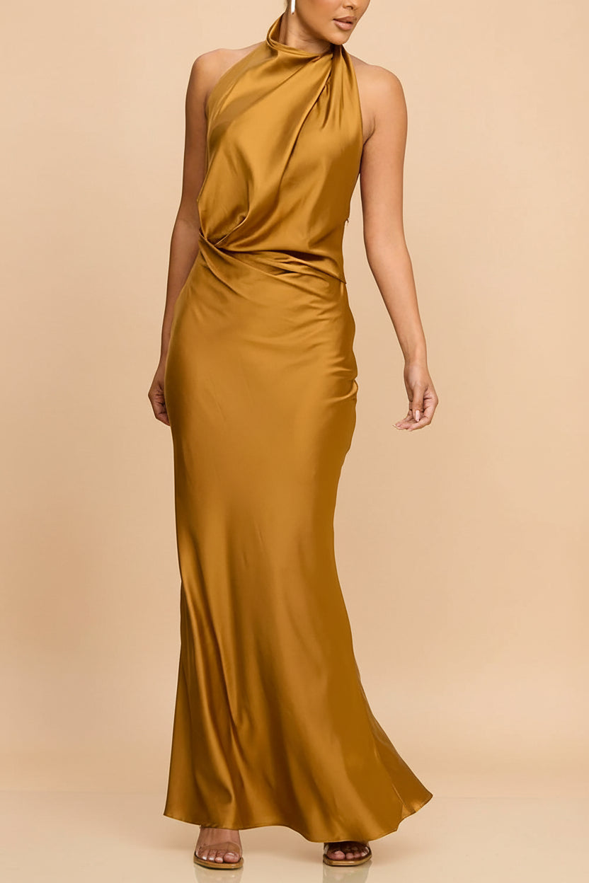 front of a woman wearing Karlee Maxi Golden Satin Gown with Open Back from Boutique 1861
