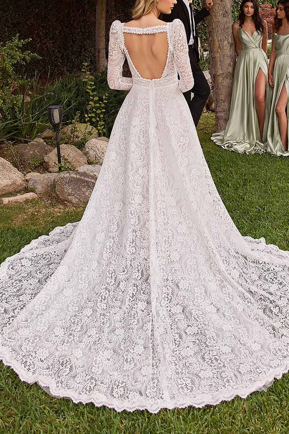 back of a woman wearing Katina Lace Bridal Dress with Removable Sleeves from Boudoir 1861