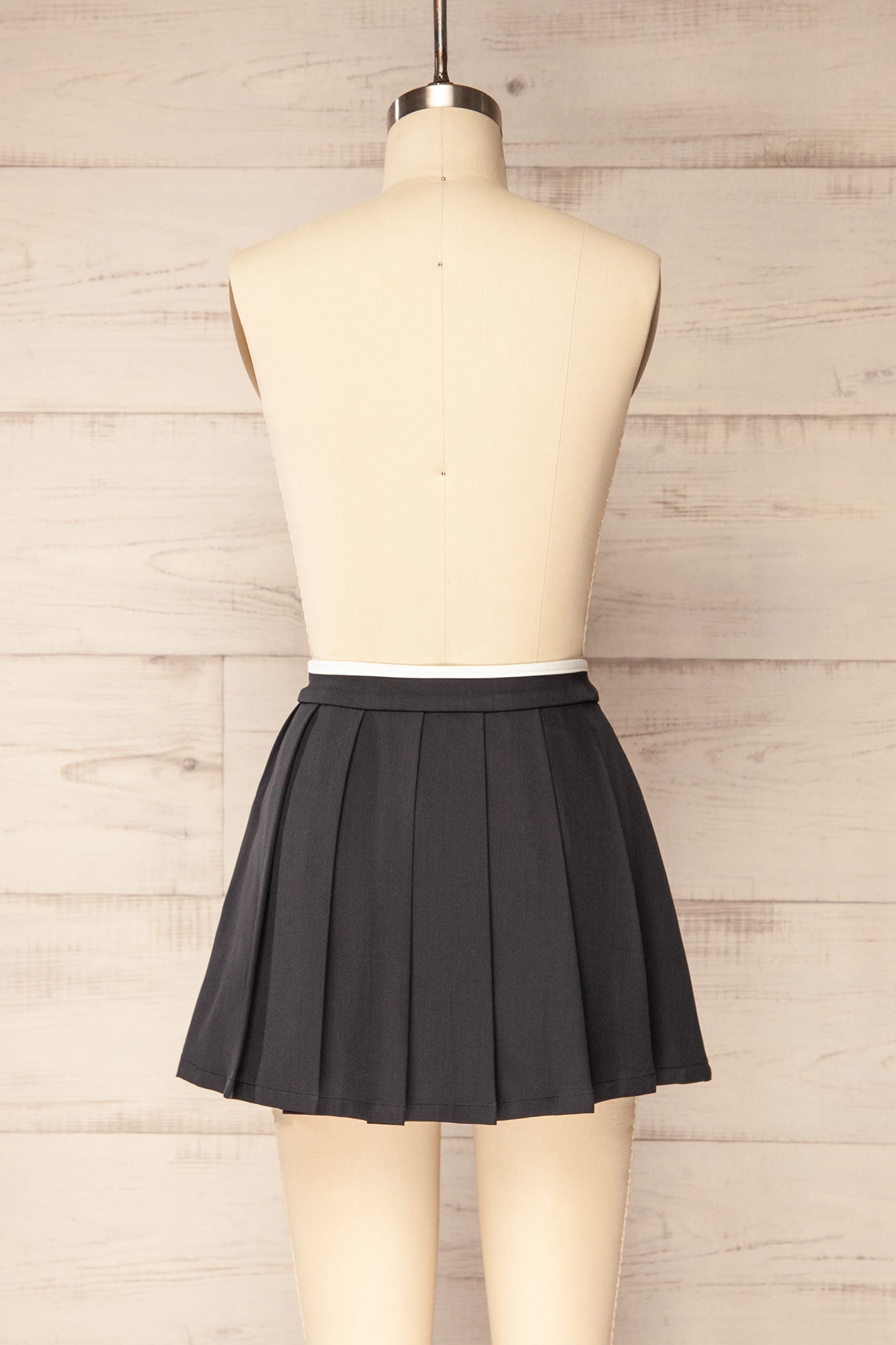 Kollam Navy Pleated Skort with Contrast Bow | La petite garçonne back view
