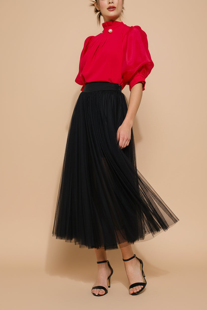 front view of a woman wearing Laurelia Black Maxi Tulle Low Rise Skirt from Boutique 1861