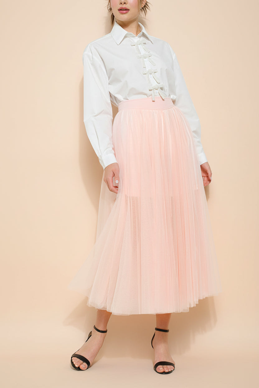 view of a woman wearing Laurelia Blush Low Rise Tulle Maxi Skirt from Boutique 1861