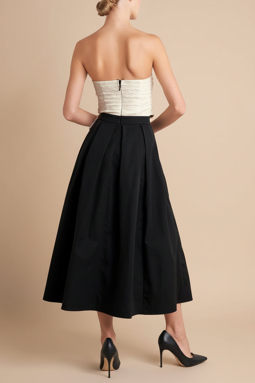 back view of a woman wearing Lindsay Midi Strapless Dress with Draped Bodice from Boutique 1861