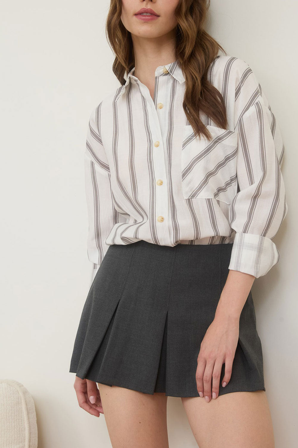Woman wearing Loubinette Oversized Striped Shirt from La petite garçonne front