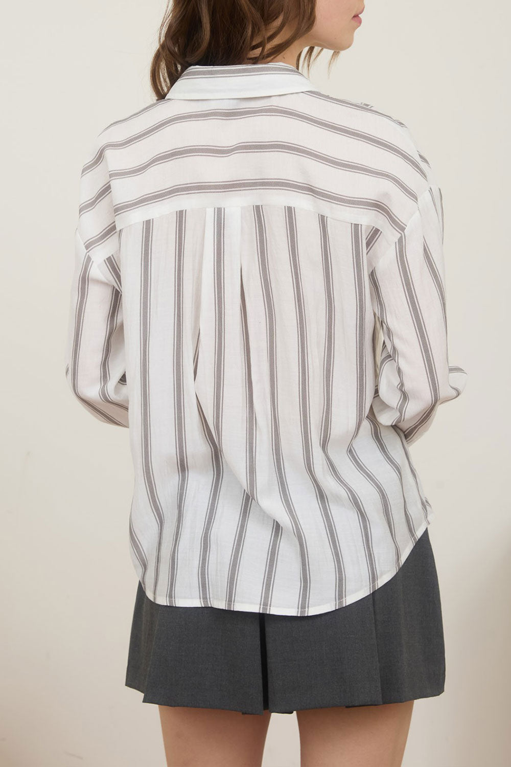 Woman wearing Loubinette Oversized Striped Shirt from La petite garçonne back