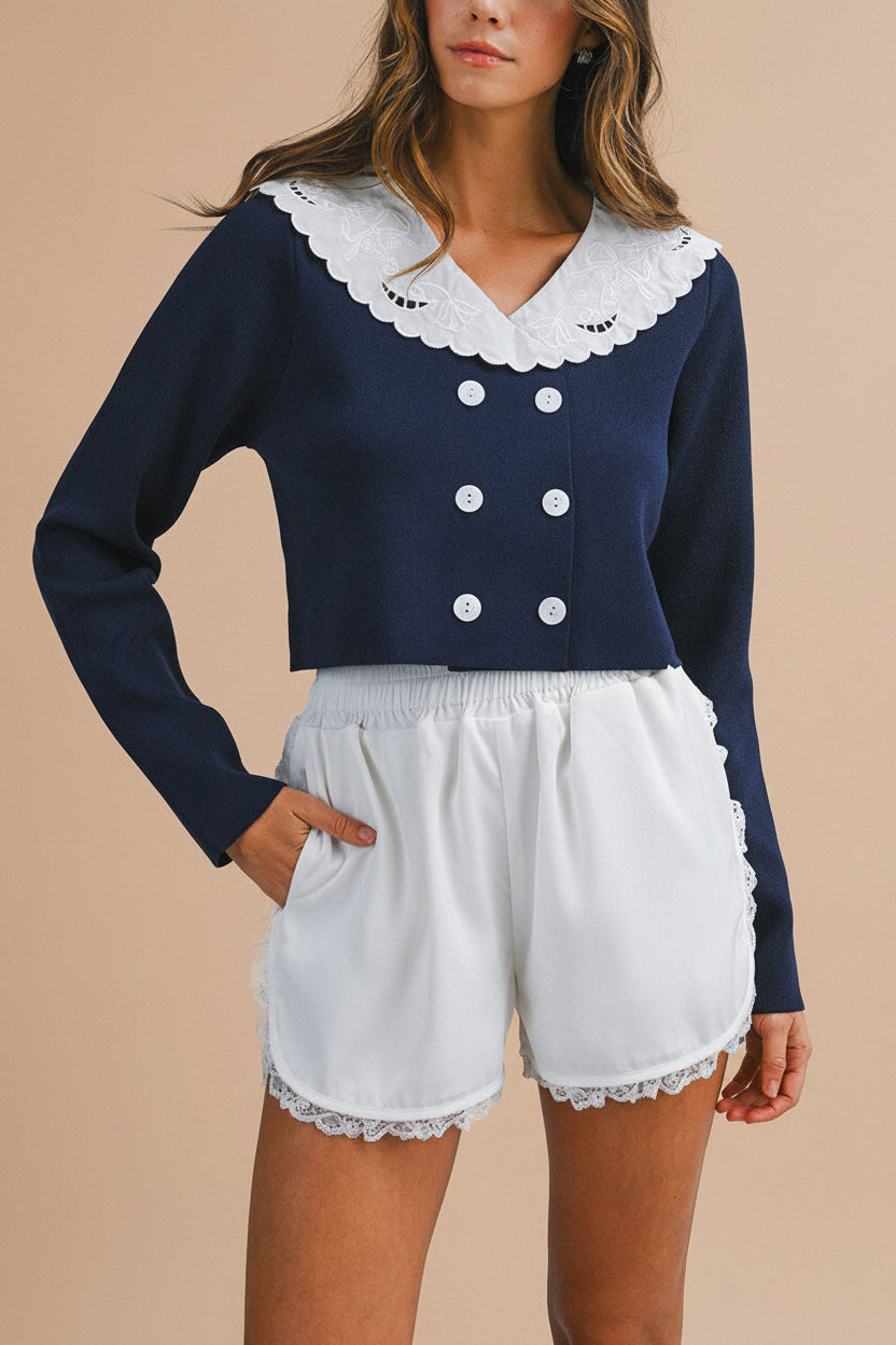 front of a woman wearing Lynette Navy Cropped Top with Peter Pan Collar from Boutique 1861