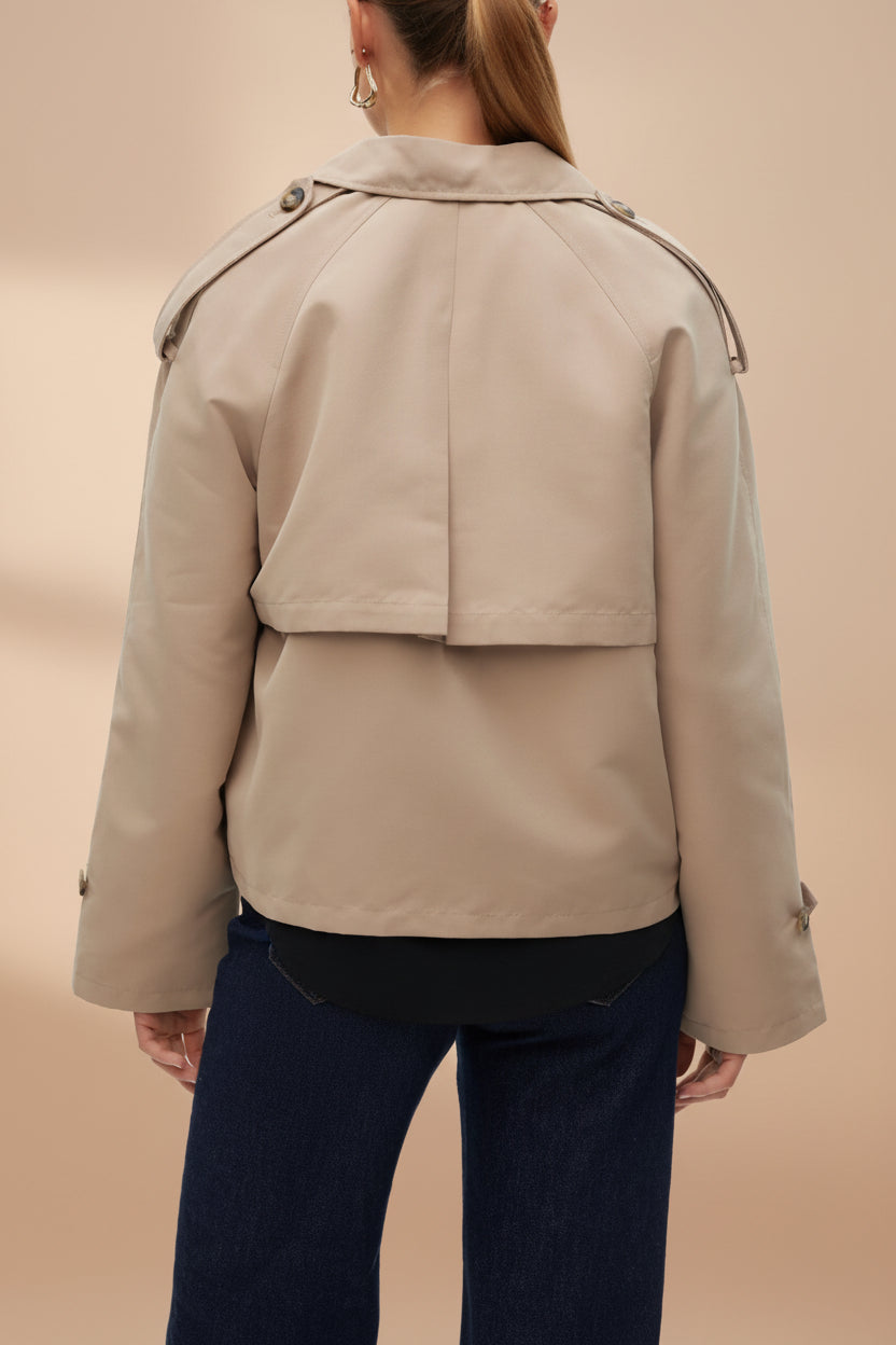 back of a woman wearing Manduria Short Trench Coat from La petite garçonne