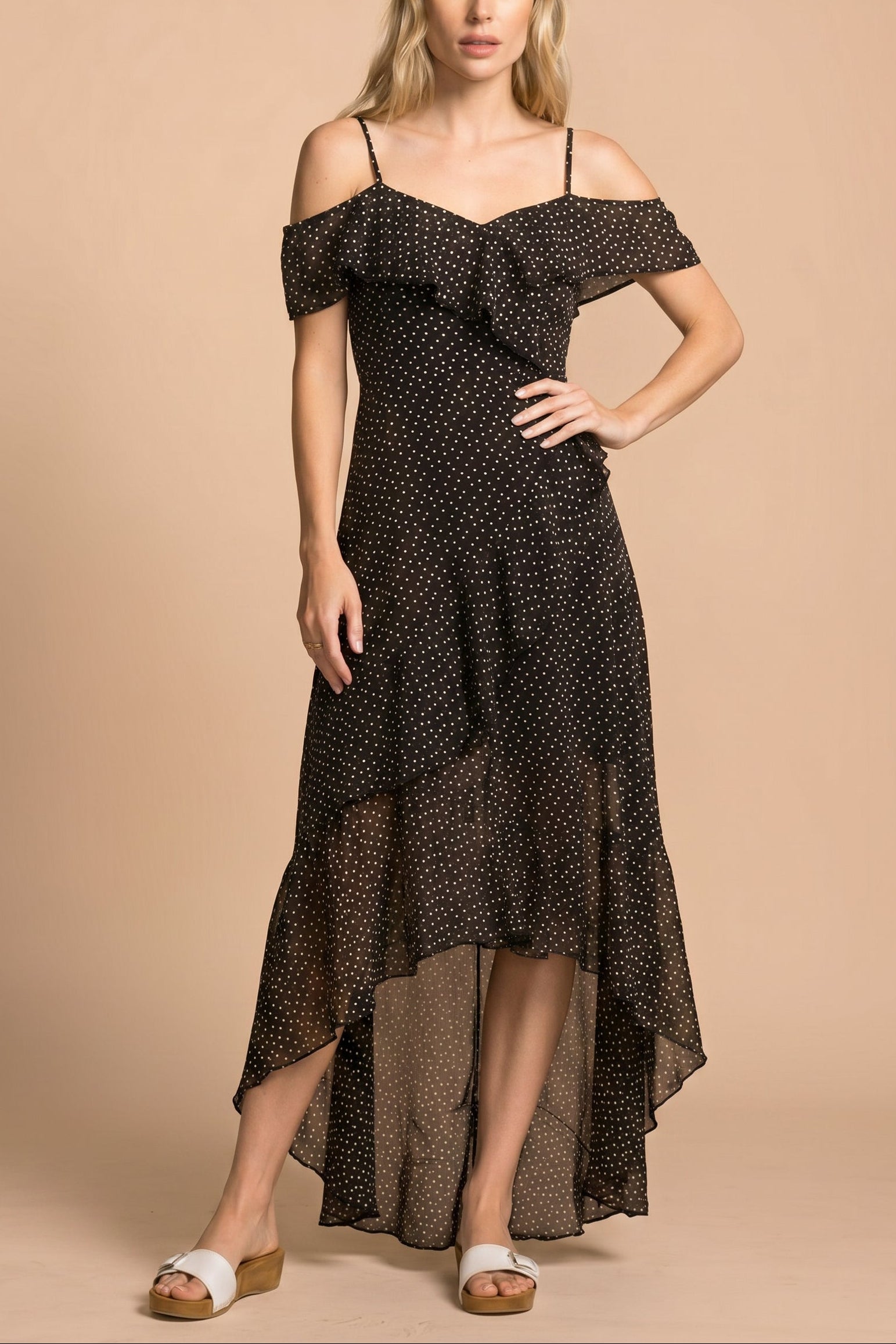 front view of a woman wearing Maralda Black Maxi Dress with Polka Dots from Boutique 1861