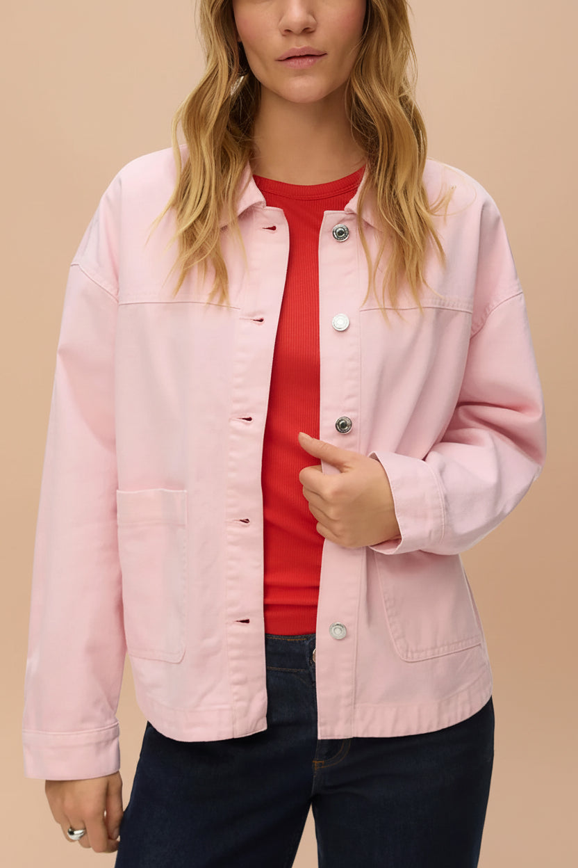 front of a woman wearing Matera Pink Denim Button-Up Jacket with Pockets from La petite garçonne