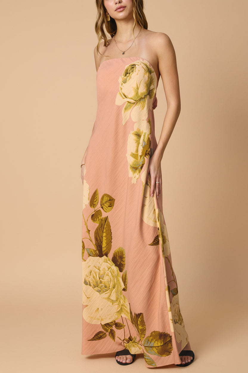side view of a woman wearing Moufida Strapless Pink Maxi Dress with Pockets from Boutique 1861
