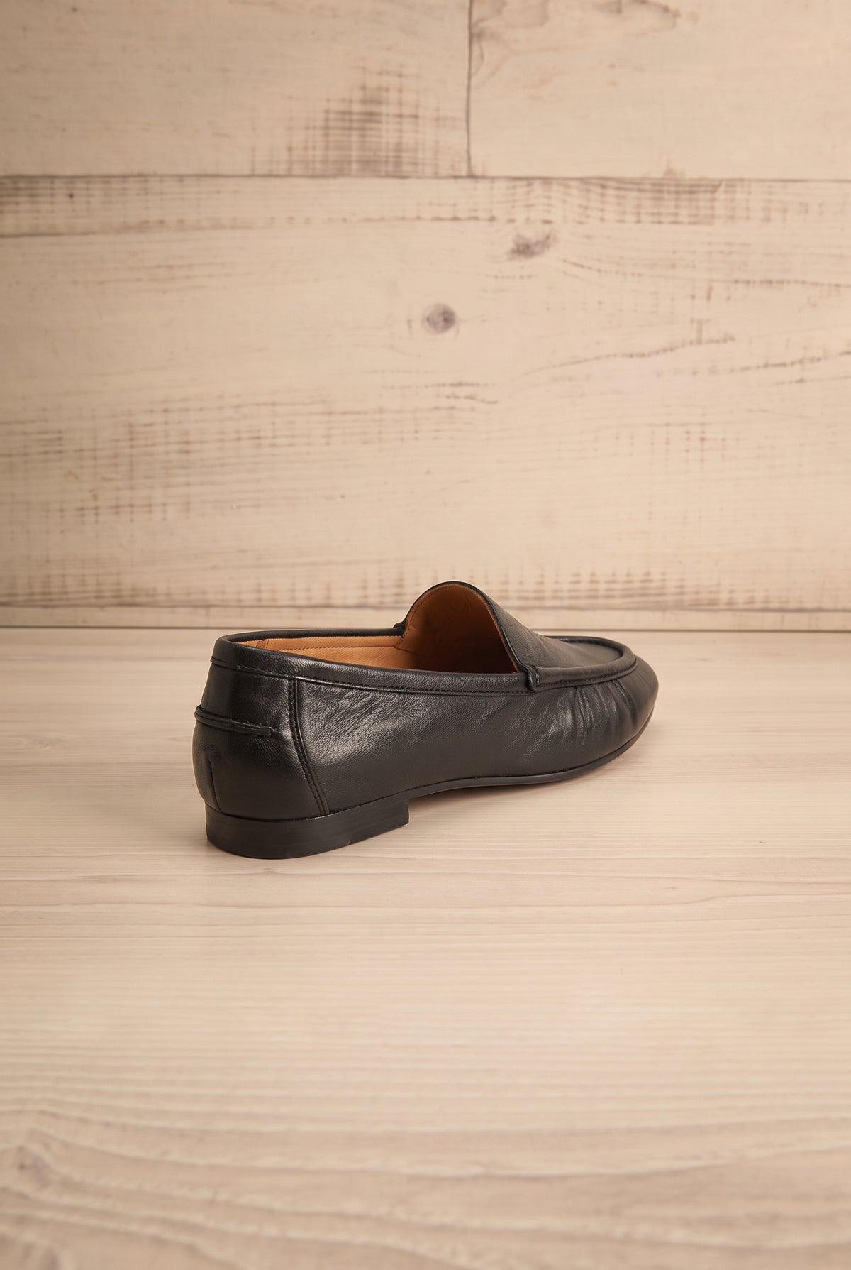 back view of Matty Black Leather Round Toe Loafer Shoes at La petite garçonne
