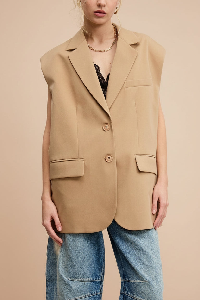 Woman wearing Myret Long Sleeveless Beige Blazer from La petite garçonne