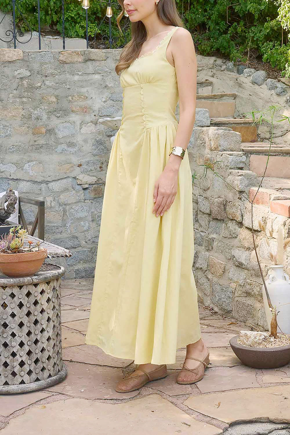 side view of a woman wearing Nena Yellow Long Dress with Square Neckline from Boutique 1861