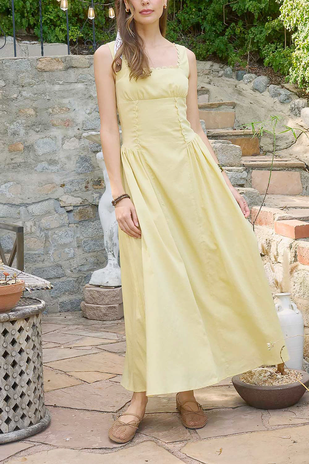 front view of a woman wearing Nena Yellow Long Dress with Square Neckline from Boutique 1861