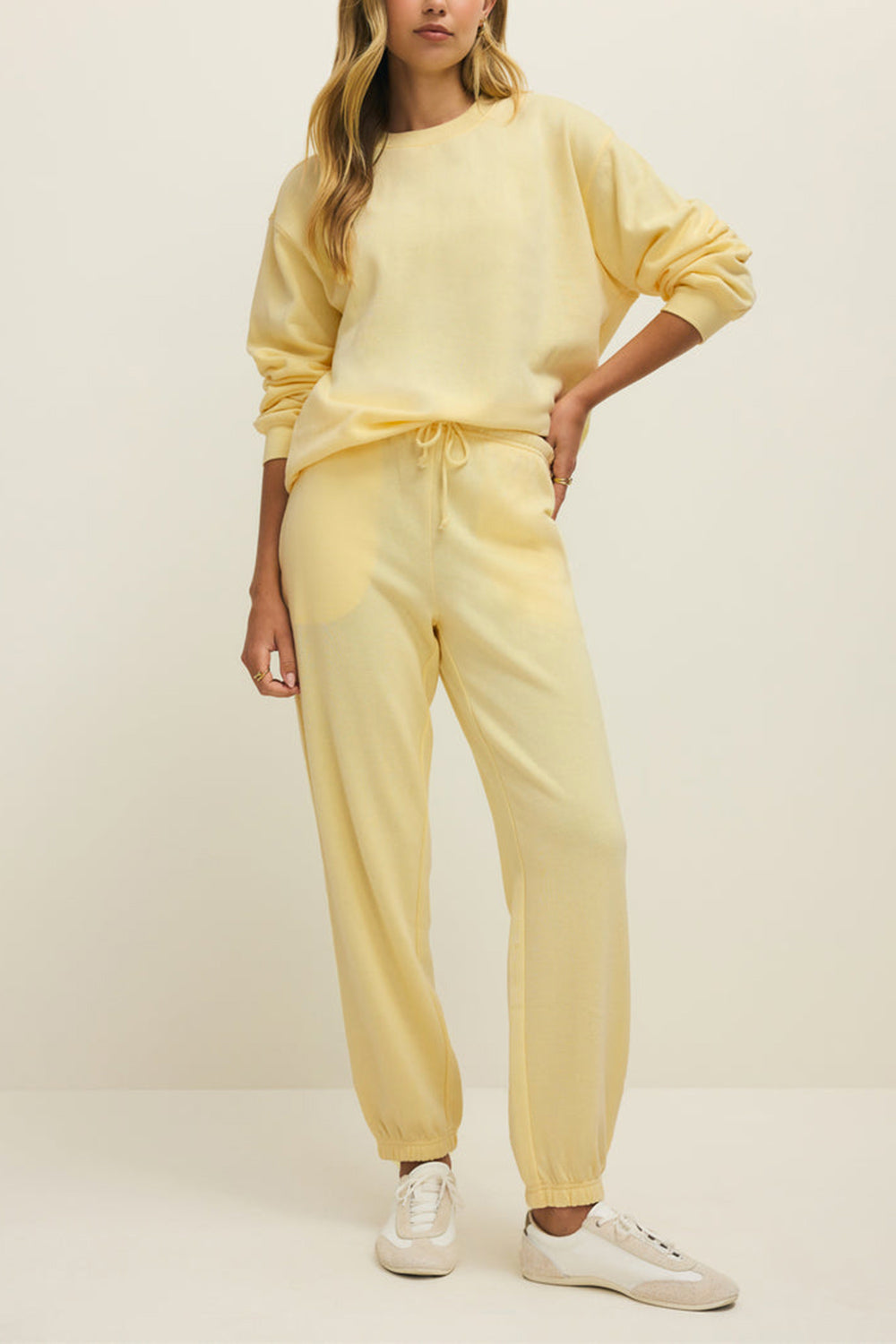 front view of a woman wearing Nesna Yellow Oversized Sweatshirt from La petite garçonne