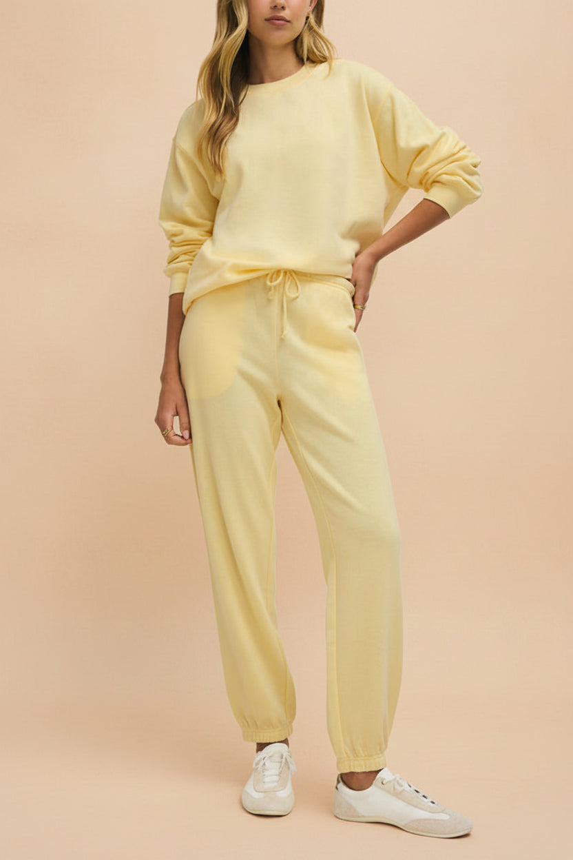 front view of a woman wearing Nesna Yellow Oversized Sweatshirt from La petite garçonne