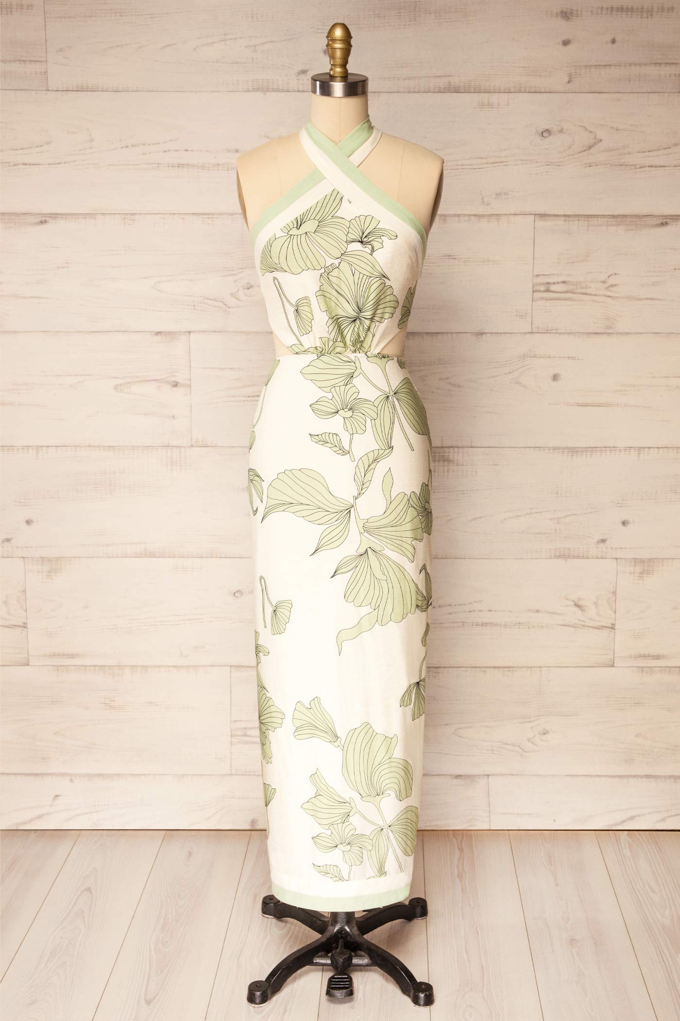 Nadiah White Botanical Print Halter Midi Dress with Waist Cutouts and Slit | La petite garçonne front view