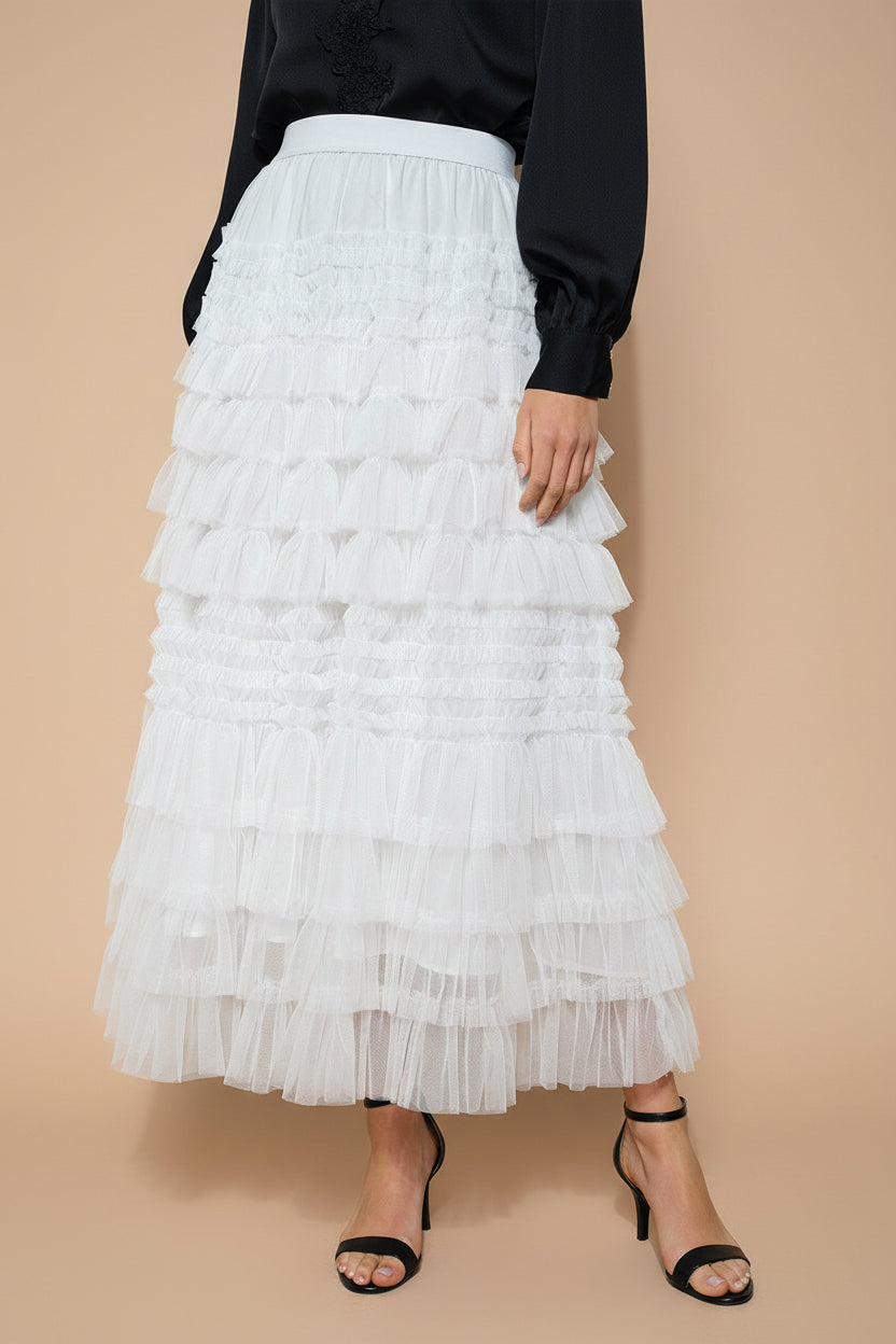 front view of a woman wearing Poema White Maxi Tulle High-Waisted Skirt from Boutique 1861