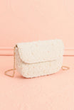 profile view of Prince Ivory Beaded Pearl Clutch and Crossbody Bag at boudoir 1861
