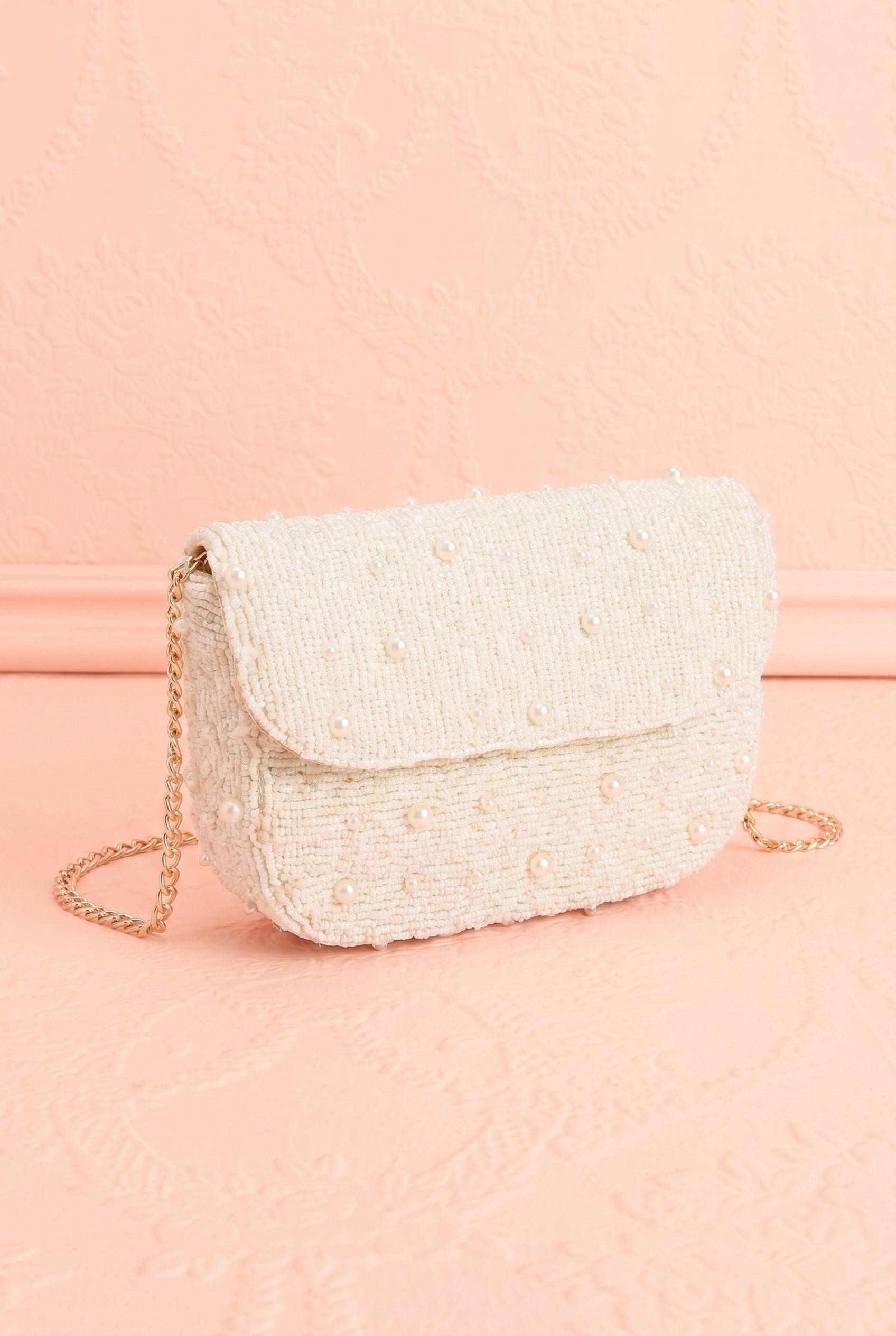 profile view of Prince Ivory Beaded Pearl Clutch and Crossbody Bag at boudoir 1861