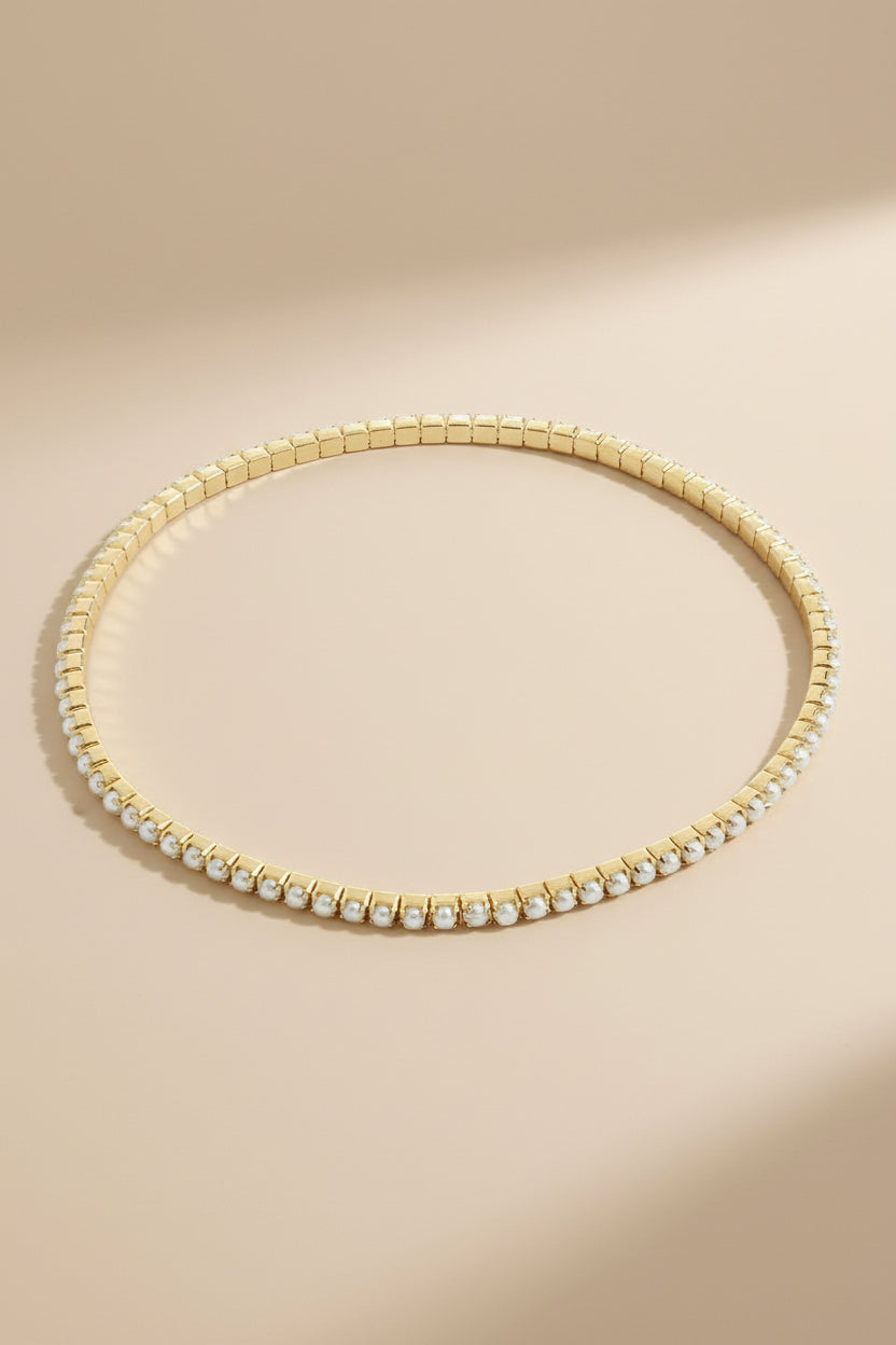 Close-up of a beaded gold bracelet ARASHIA from Pilgrim available at la petite garçonne in Montreal