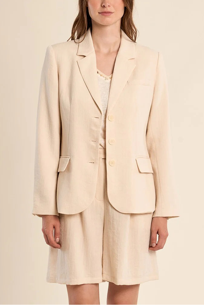 frontview of woman wearing Rajmahal Structured Ivory Blazer from la petite garçonne
