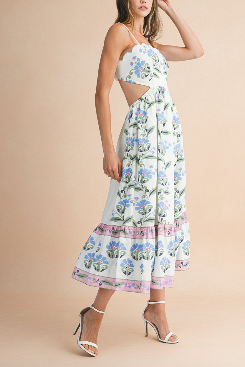 side view of a woman wearing Raleigh Floral Midi Dress with Scalloped Neckline from Boutique 1861