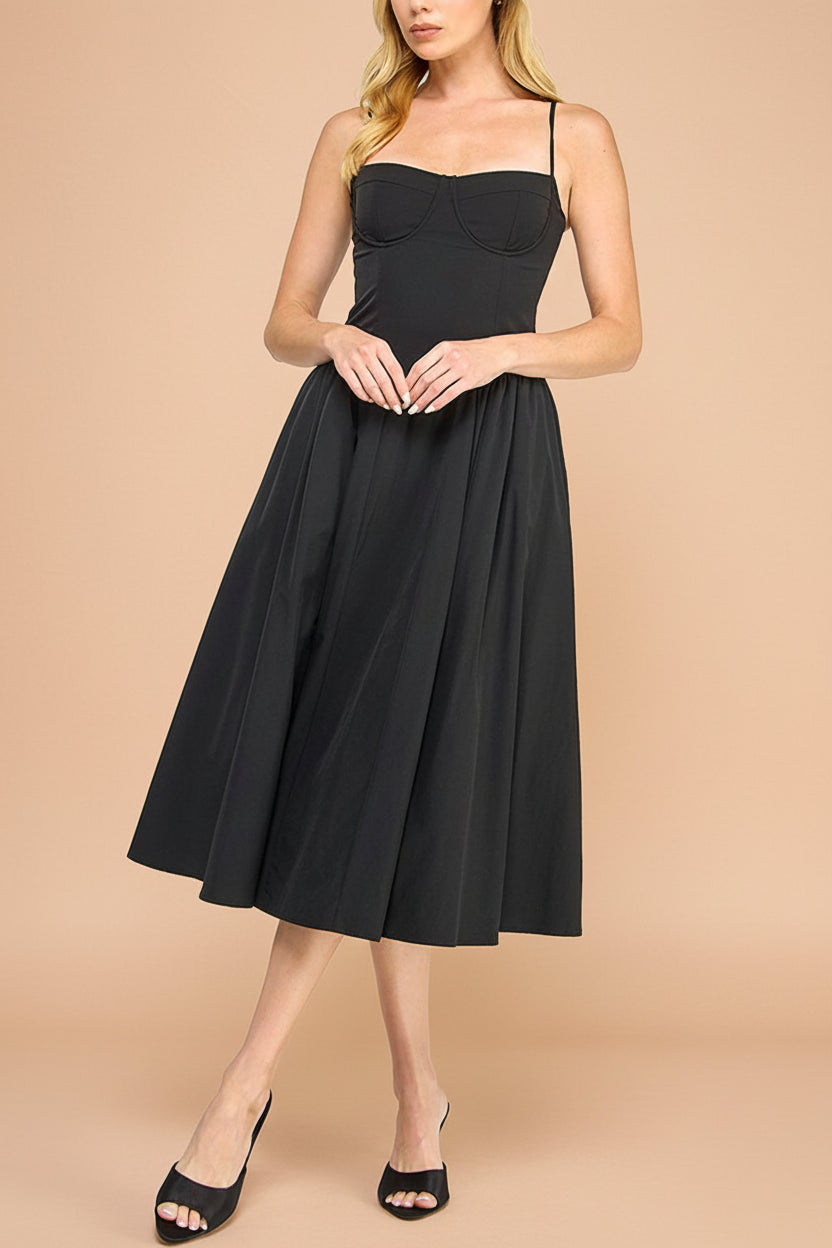 front view of a woman wearing Rhonda Black Bustier Midi Dress with Flared Skirt from Boutique 1861