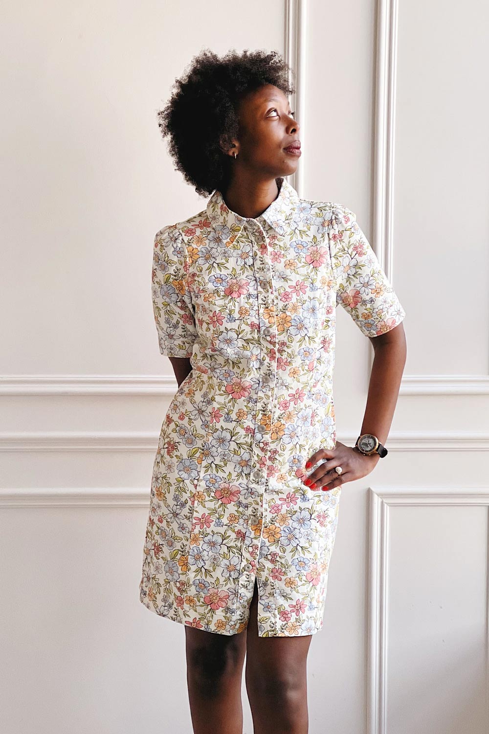 Dorcas | Short Button-Up Denim Floral Dress- Boutique 1861 on model