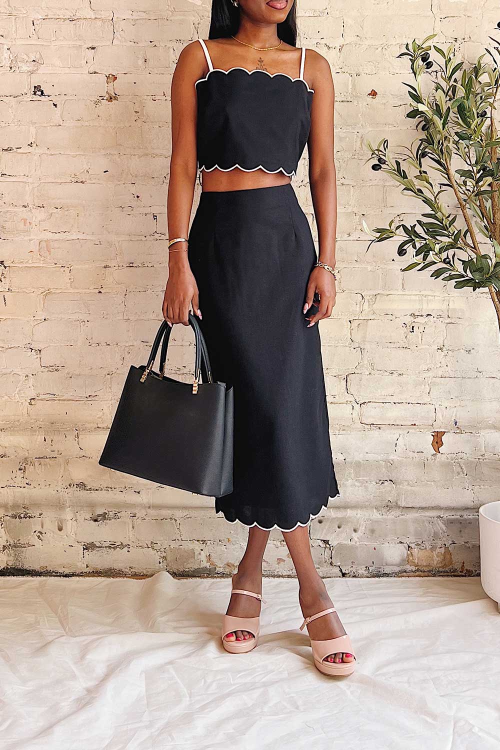 Kalissa | Black Midi Skirt w/ Scalloped Hem Boutique 1861 on model