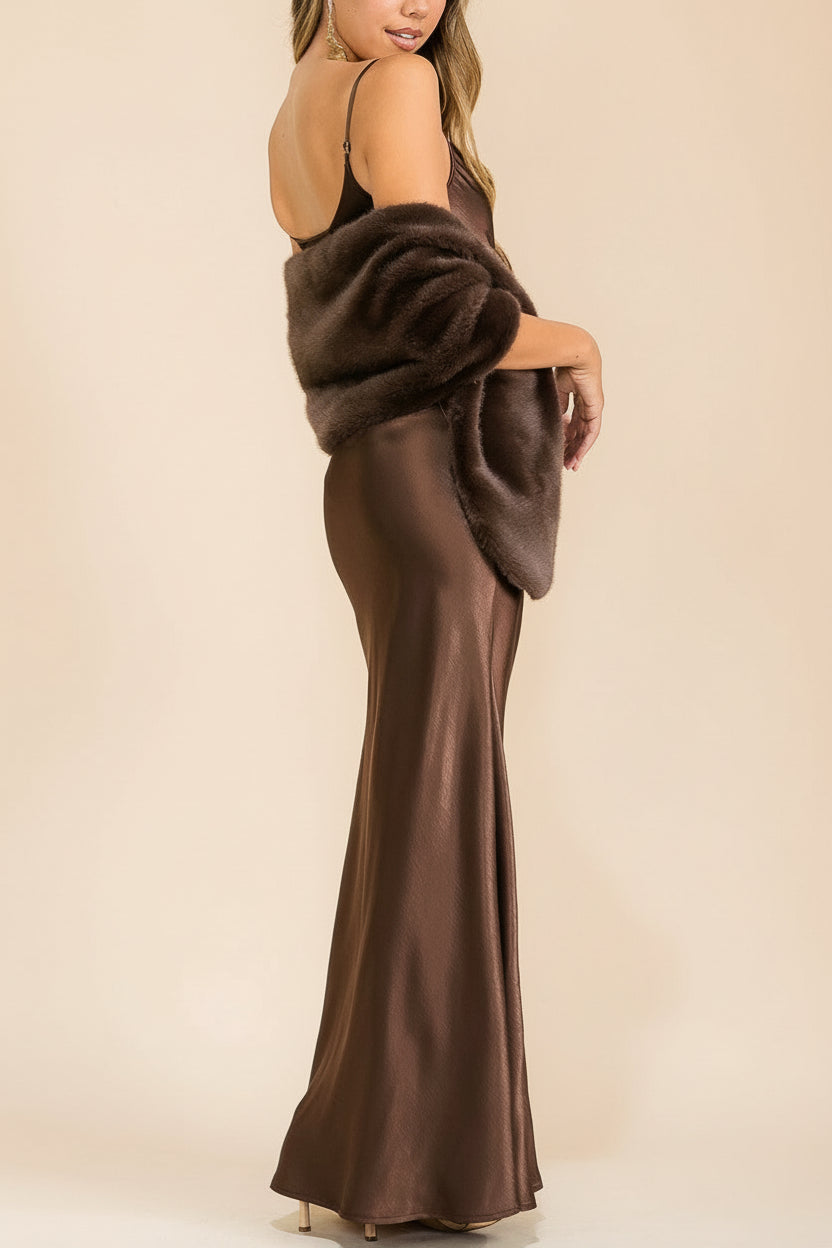 Back view of a Woman wearing the Safiya brown Satin Maxi Dress with Faux Fur Shawl from boutique 1861