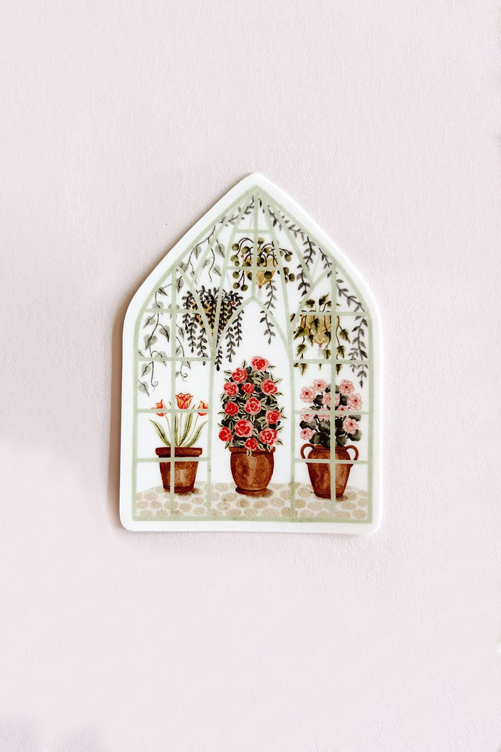 Decorative sticker art with potted plants inside a window frame from Marie-Lise