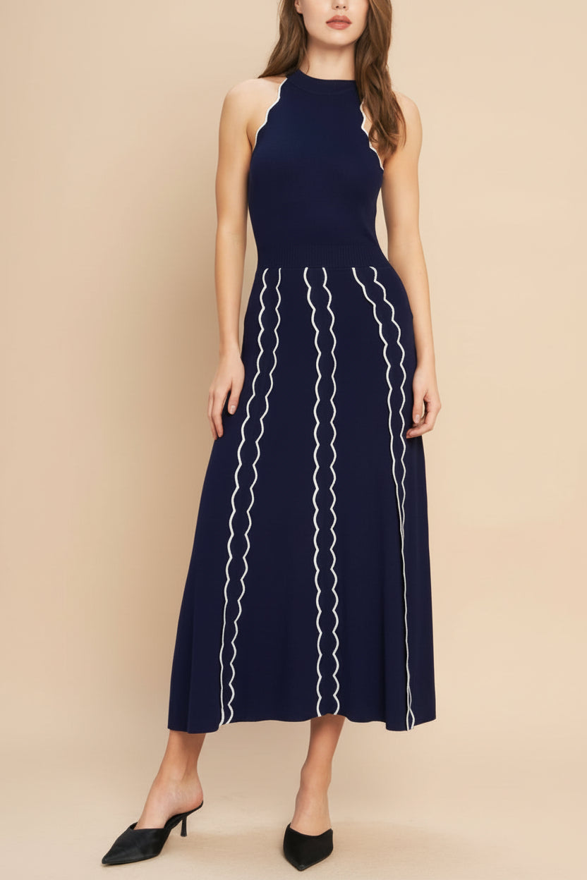 front view of a woman wearing Sharleen Navy Knit Sleeveless Midi Dress from Boutique 1861