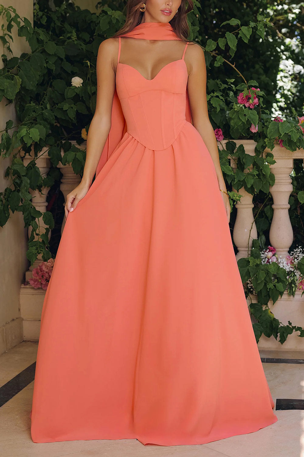 view of a woman wearing Syana Coral Long Chiffon Corset Dress with Scarf from Boutique 1861