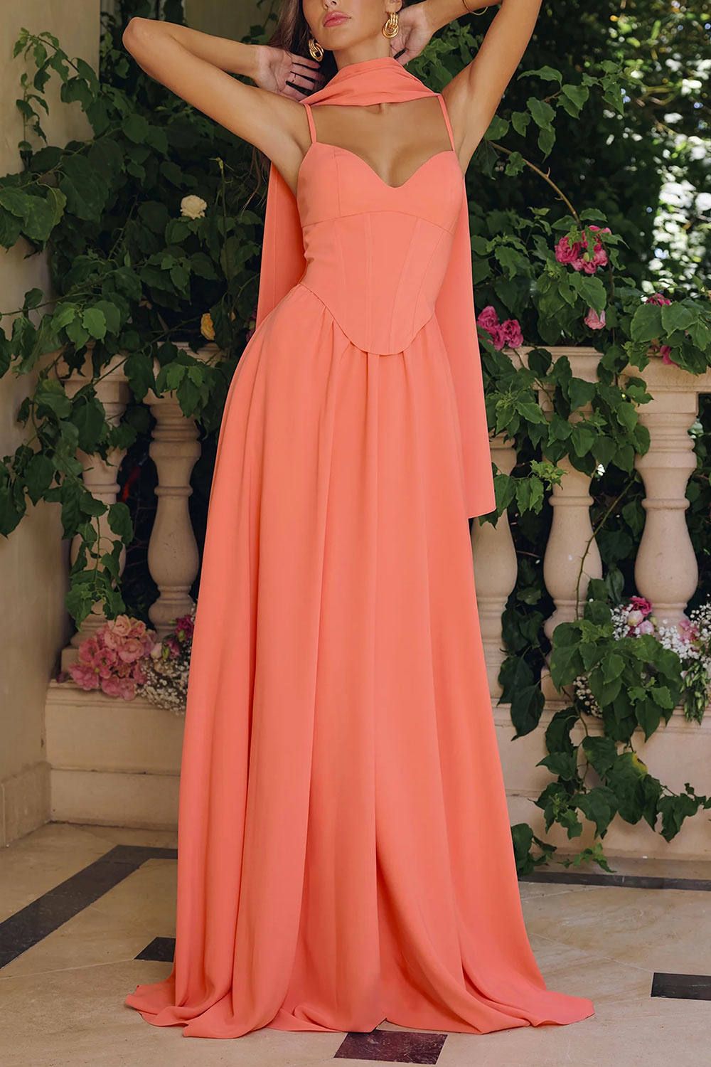 front view of a woman wearing Syana Coral Long Chiffon Corset Dress with Scarf from Boutique 1861