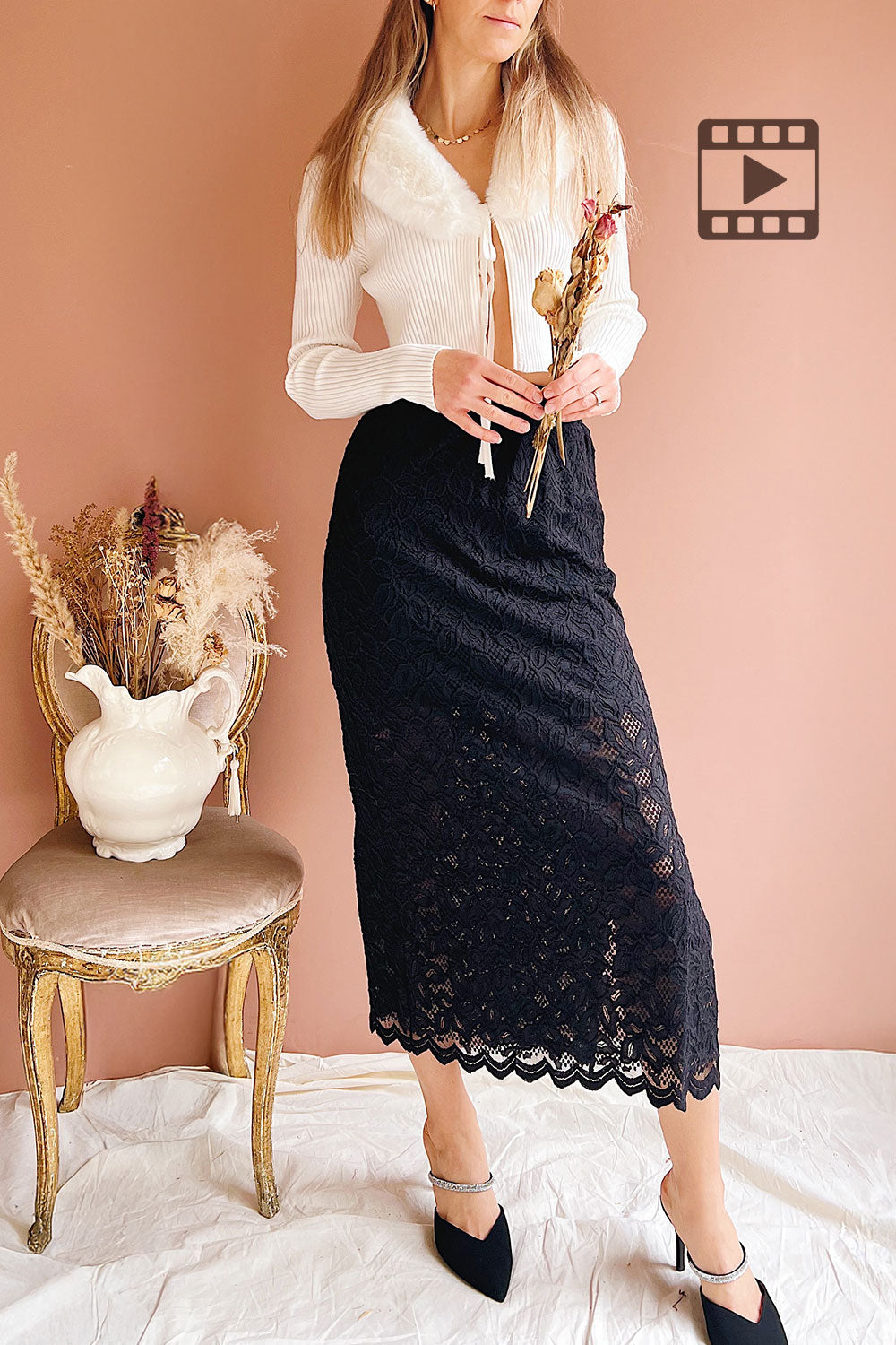 Woman wearing Sherie Ivory Ribbed Cardigan with Faux Fur Collar from Boutique 1861