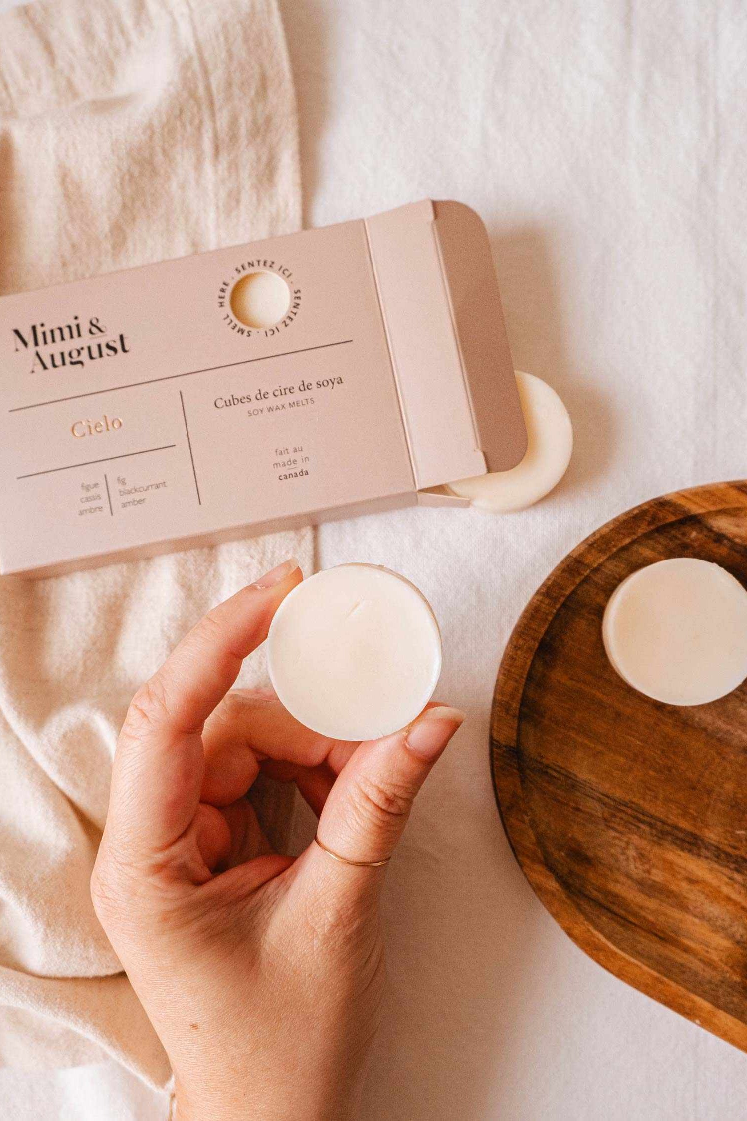 hand holding Cielo Soy Wax Melts at Maison garçonne