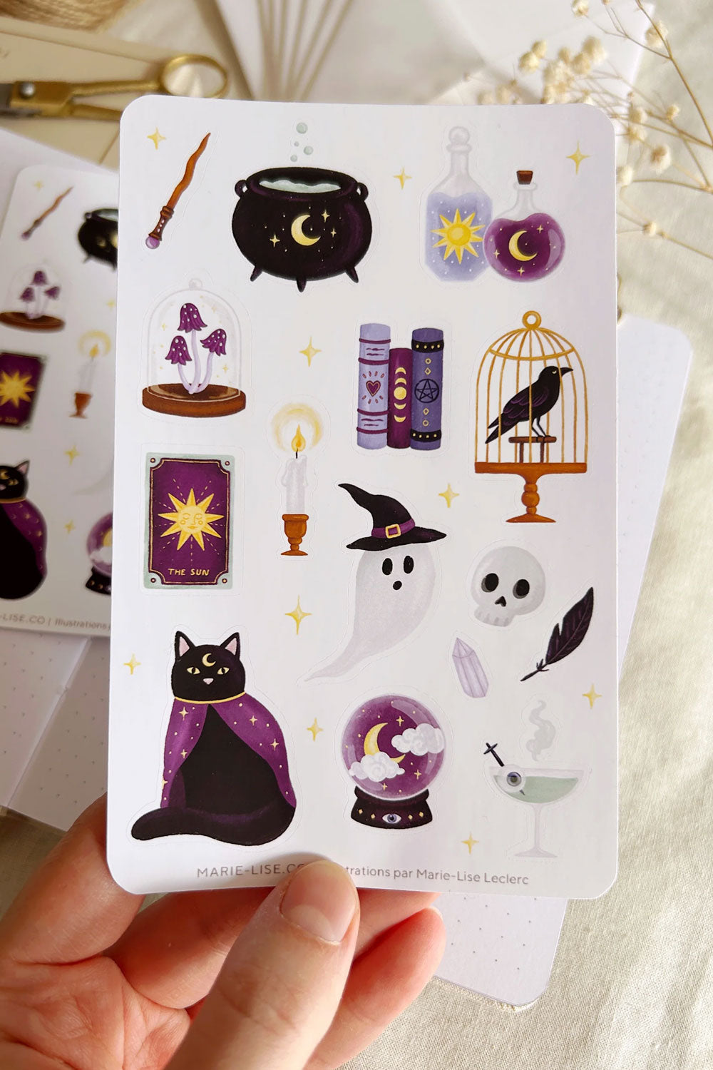 Halloween-themed Photo of Spooky Sticker Sheet on a card held by a hand