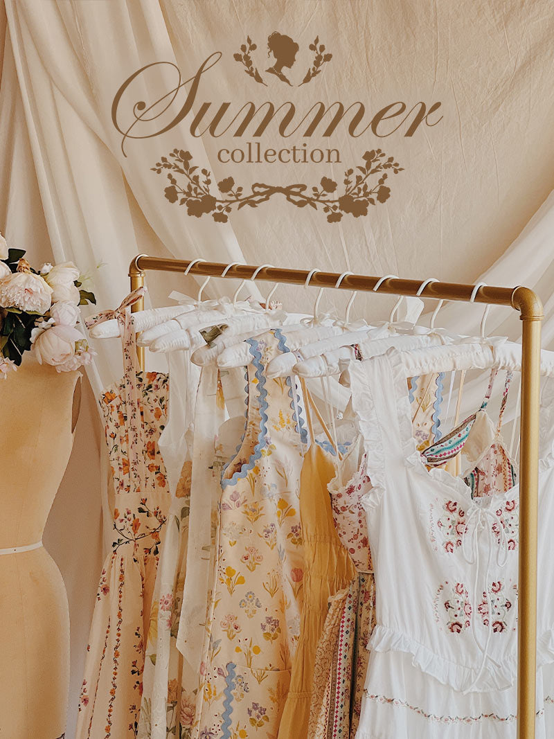 Summer collection with floral dresses, lightweight blouses, and feminine summer outfits.
