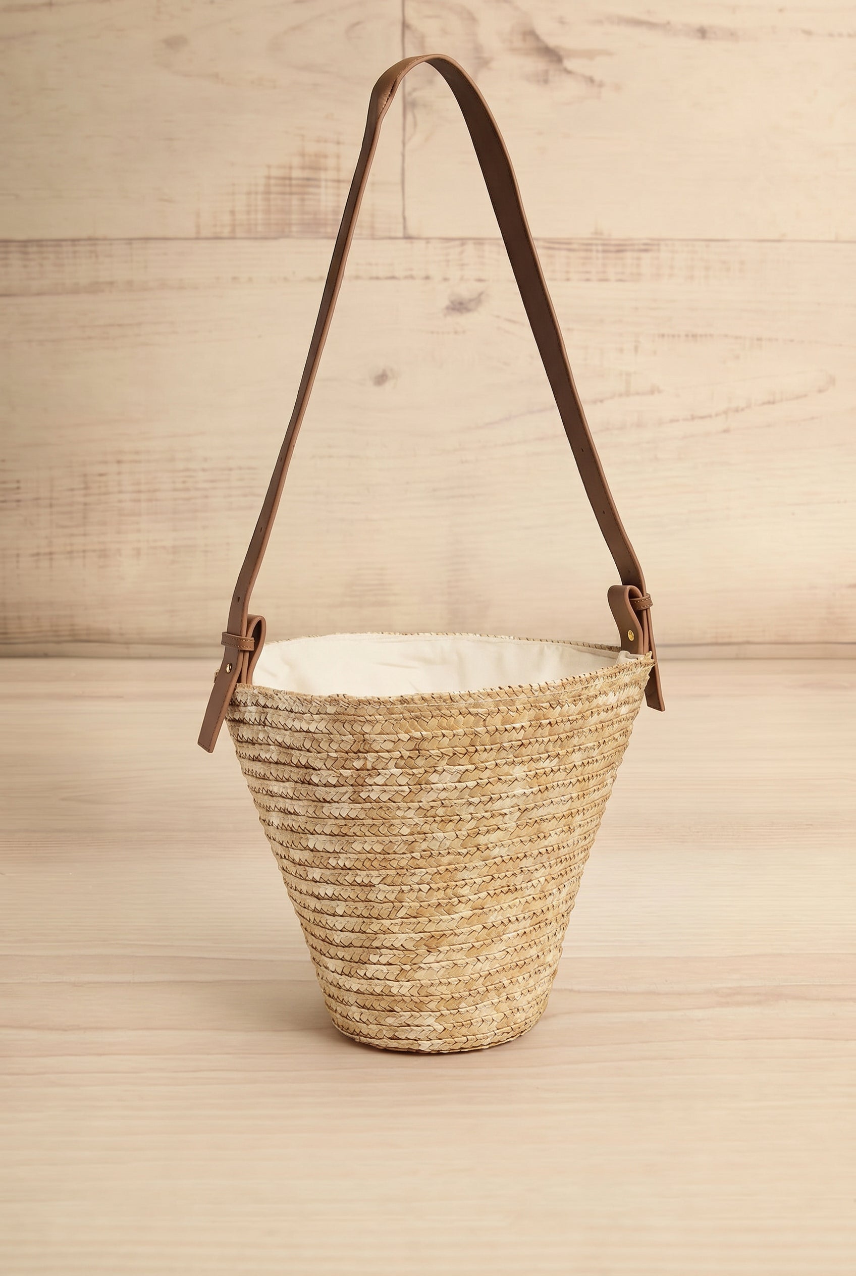 Frontview of Tazza Woven Straw Crossbody Bag at la petite garçonne