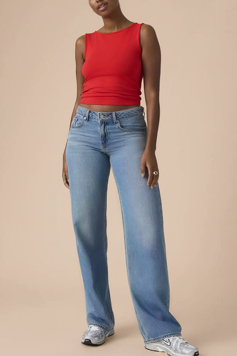 front of a woman wearing Tuscania Low Rise Blue Denim Pants from La petite garçonne