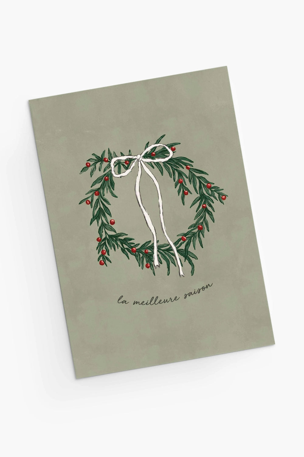 Christmas Sage green card grom Mimi & August with a festive wreath design and text on a white background